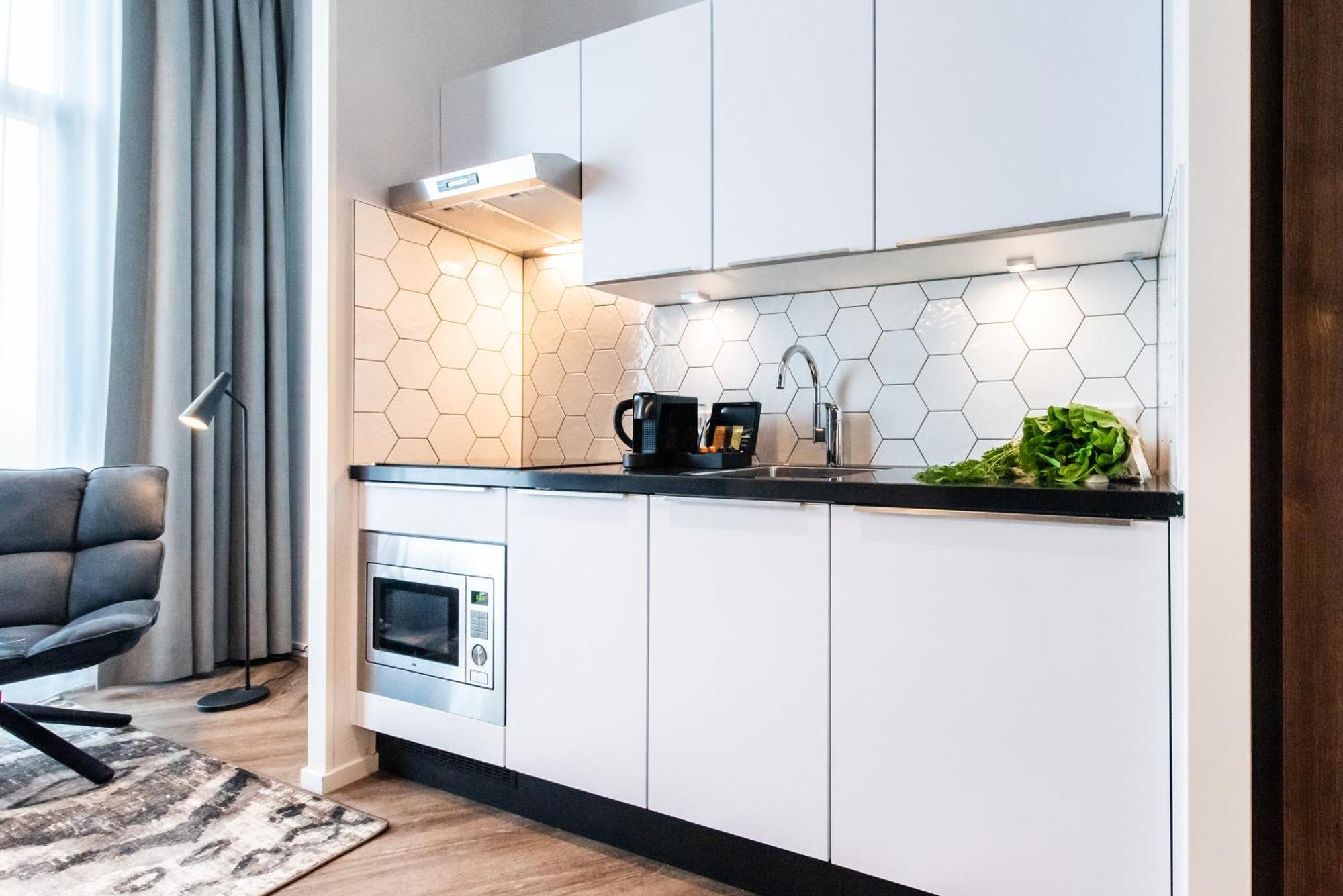 Апарт отель Numa Amsterdam Docklands Экстерьер фото