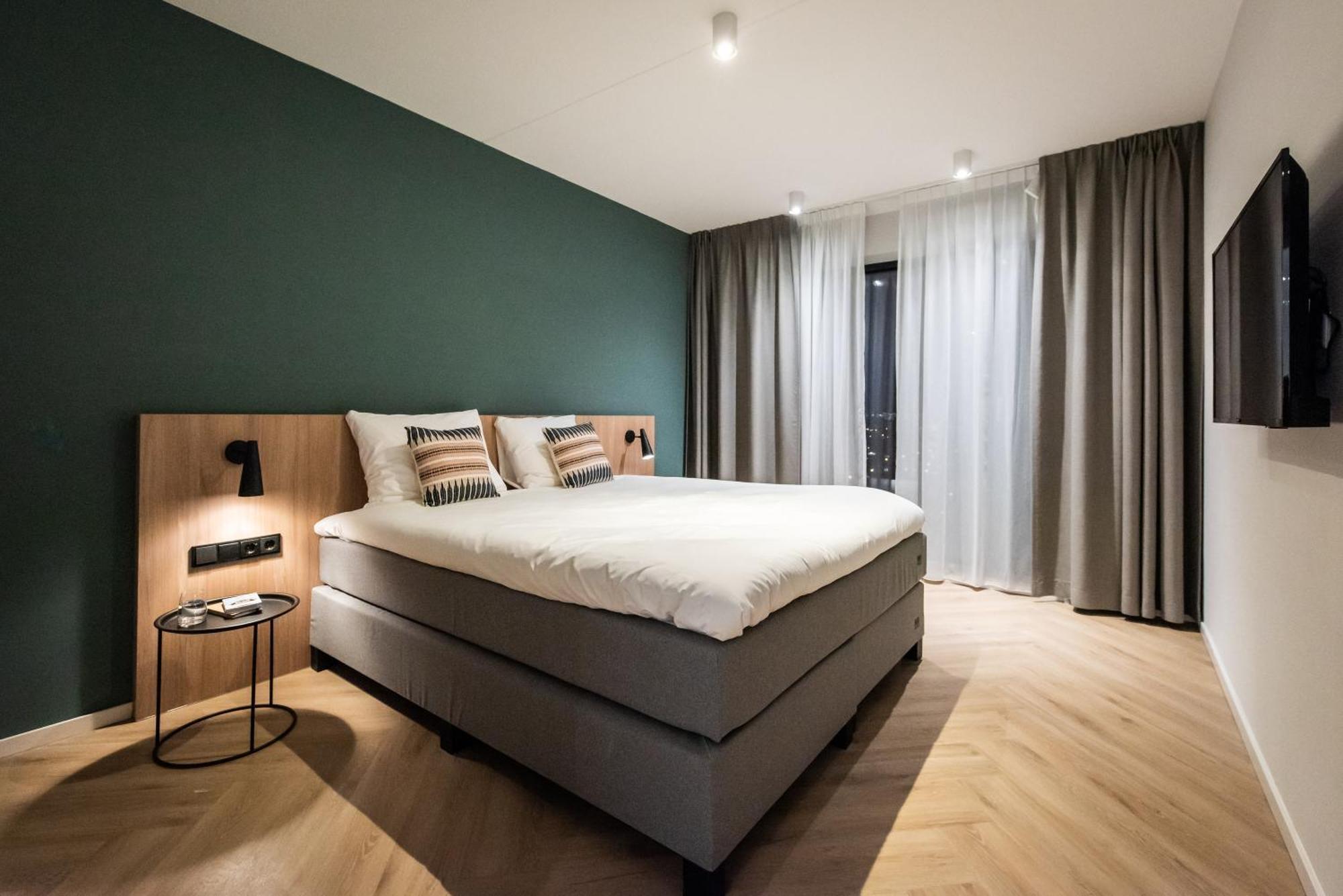 Апарт отель Numa Amsterdam Docklands Экстерьер фото